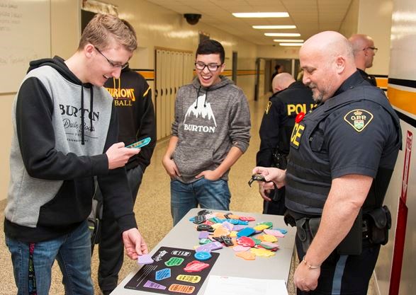 Const. Lonne Foeller, of the Central Hastings detachment, engages students at CHSS in a game that demonstrates just how difficult multi-tasking can be — just like texting and driving. - Taylor Bertelink