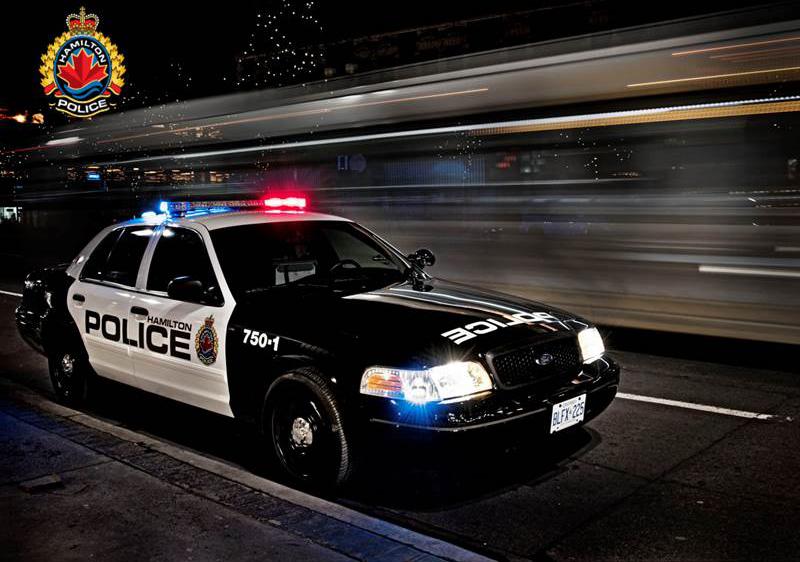 Hamilton Police cruiser with police logo in top left corner