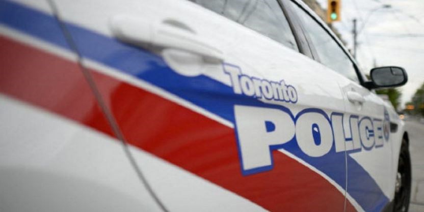 picture of the Toronto Police logo on a cruiser
