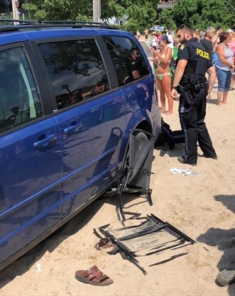 Dad pushes daughter to safety, blocks van of allegedly drunk driver on Port Dover beach