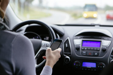 Insurer reacts to new distracted driving penalties