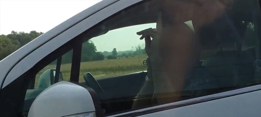 Look, mom, no hands: Distracted driver appears to ask Caledon OPP to hold on while finishing his call