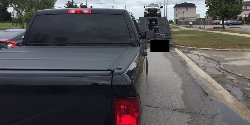 ‘Stopped completely in left lane’: Police say Burlington driver on phone holding up traffic on busy road